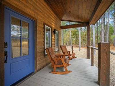 Rocking chairs welcoming you on the front porch.