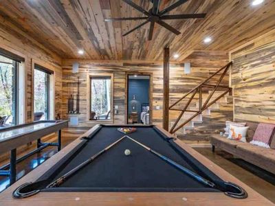 A pool table, shuffleboard and Tempurpedic Queen sleeper sofa!