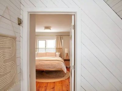 Step into the upstairs master bedroom