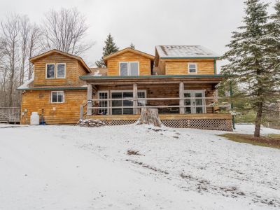 a beautiful front view of our log cabin