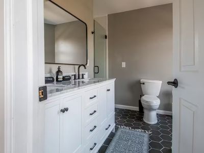 The en-suite bathroom in the primary bedroom