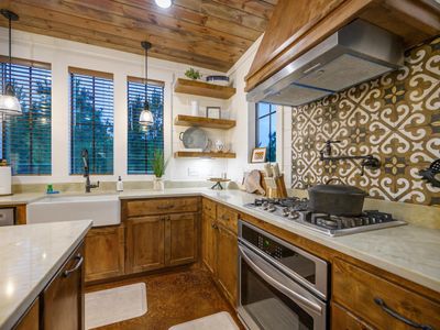 Equipped with a gas stove and an oven.