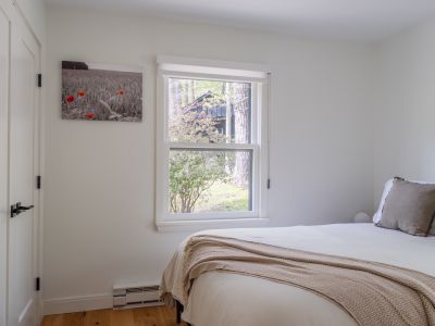Looking into the second bedroom of the main floor.