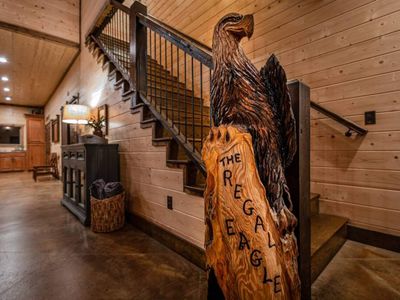 Upstairs leads to the game room and additional bedrooms.