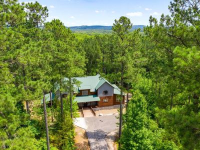 Stay Among the Pines in this luxury cabin that sleeps 20!