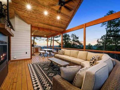 The outdoor dining and kitchen area area also upstairs on the covered patio!