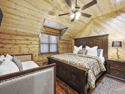 Upstairs Master Suite 4 featuring a day bed trundle for extra sleeping spots.