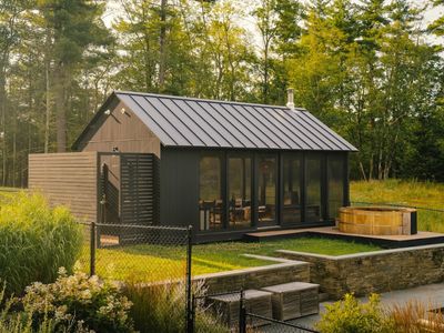 The Pool House with outdoor shower and hot tub located just to the left of the Main House