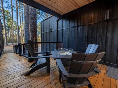Intimate 4-person table with build in firepit!