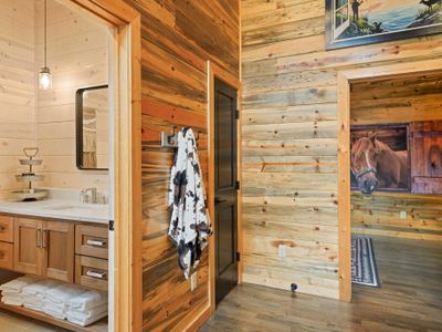 It's like a calming retreat where clean lines meet rustic elegance—your personal spa in the woods.