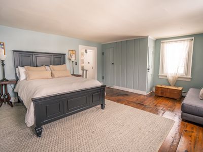 Unwind in this classic farmhouse bedroom.