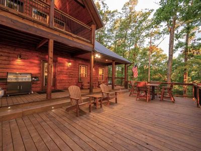 Ample amounts of seating as well as a gas grill on the patio.