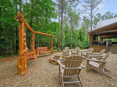 Custom wooden swings in the back yard.