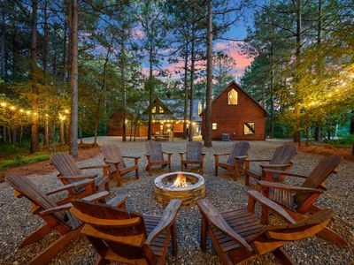 The fire pit is surrounded by chairs.