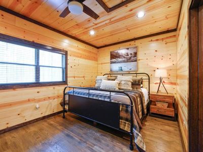Upstairs King Bedroom 2 with a trundle/daybed and a full private bathroom.
