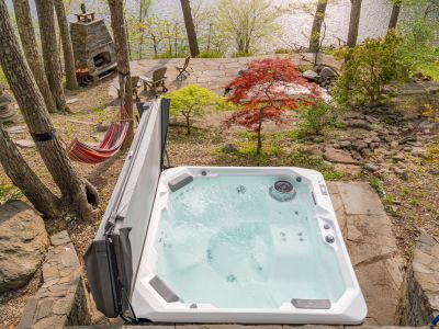 Looking down from the deck at the hot tub amid the terraced garden.