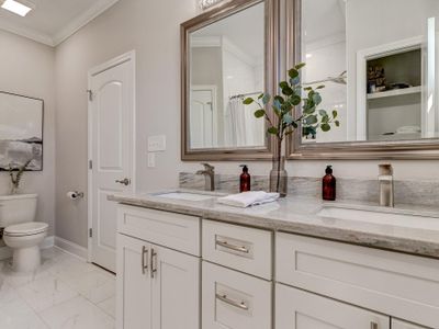 Double sinks vanity in the master bathroom