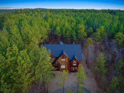 Surrounded by towering pines, this cabin is a treasure.