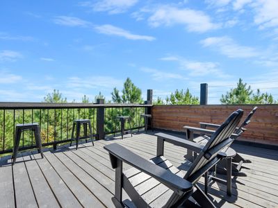 The balcony with additional seating to take in the views!