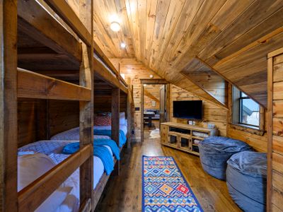 The bunk room with 4 full beds.