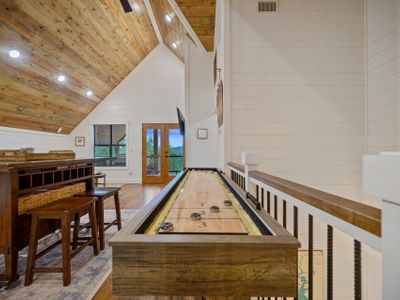 Shuffleboard, games and a private balcony!