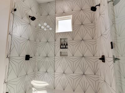 Double shower heads! Not to mention the most fabulous tile you ever could see while getting clean. (Bathroom 3.5/3.5)
