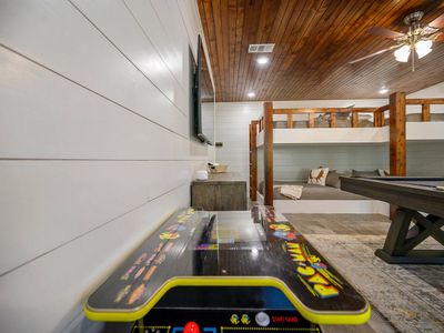 Arcade consoles are found in the game/bunk room.