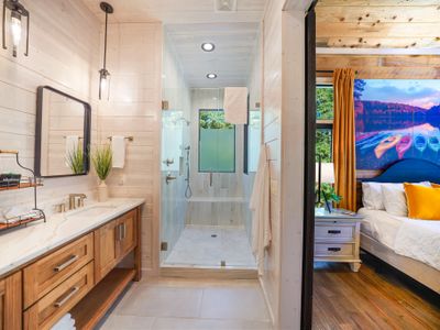 Privacy meets luxury in this beautifully crafted ensuite bathroom, where warm textures and clean finishes soothe the senses.