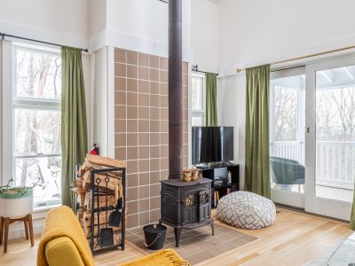 Oversize windows fill the guest house with light.