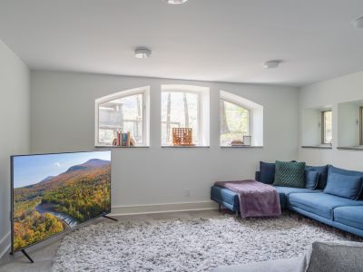 On the bottom floor, you'll find this spacious lounge area for everyone to gather.