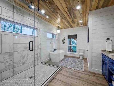 The private bathroom has a walk-in shower and tub!