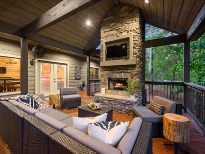 A gas fireplace is at the heart of the main outdoor living area!