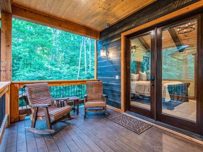 Rocking chairs on the covered patio accessible by the Master Suite.