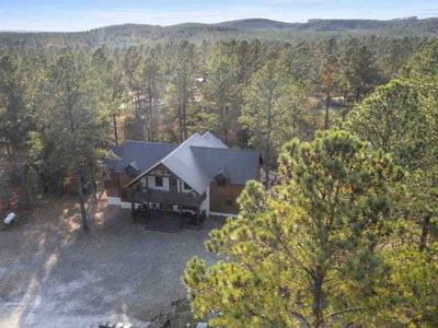 The pines stand tall around Yellowstone Lodge.