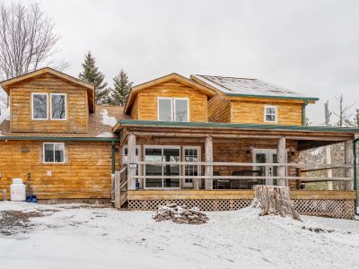 a beautiful front view of our log cabin