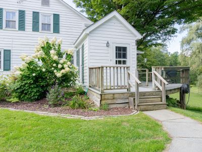 Walkway to the mudroom entry of the home.