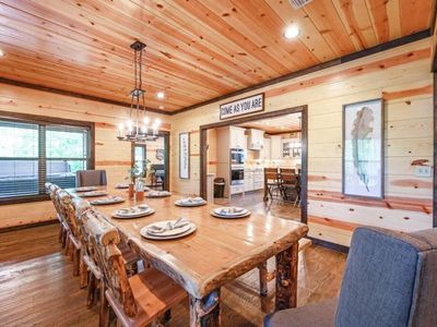 The formal dining table is set and ready for a meal to be enjoyed!