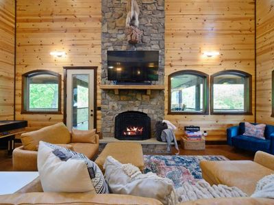 The heart of the main living area is the gas fireplace and smart tv.