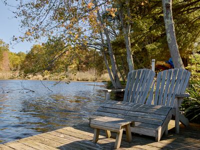 Adirondack chairs for lounging on the dock.