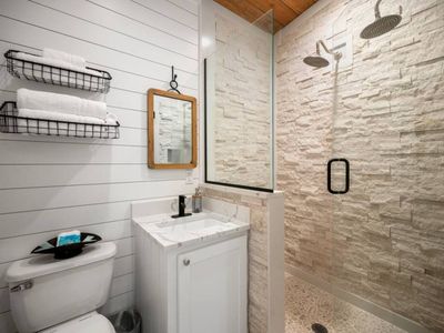 Private bathroom with a walk-in shower.