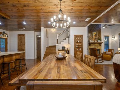 The formal dining table seats 7
