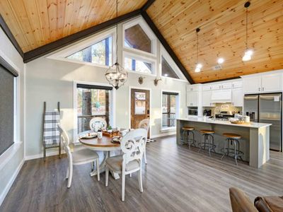 The formal dining and kitchen areas are seamlessly connected.