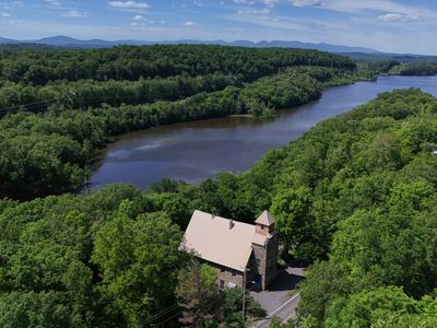 A bird's eye view of The Rifton. The Wallkill River meanders in the background, with the Catskill Mountains on the horizon.