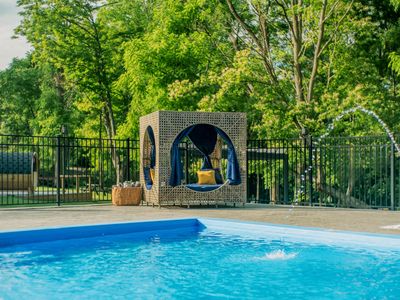 Cabanas are set up around the pool for your relaxation and enjoyment.