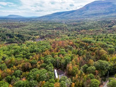 Aerial view with Catskill Mountains in the distance.