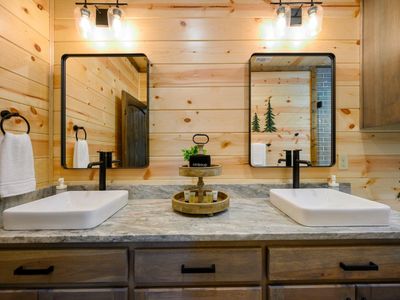 Private bathroom with double vanity.