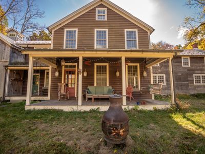 Beautiful front porch is perfect for enjoying the fall foliage