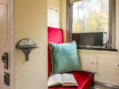 The Porter's Seat makes the perfect little nook to snuggle up with a book after you've boarded the train.