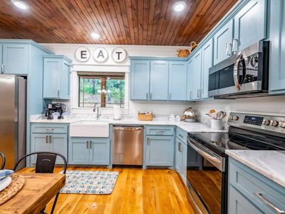 The kitchen features updated appliances and ample amounts of space!