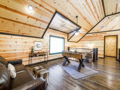 Additional entertainment space in the upstairs loft.